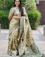 Graceful Pista Green Silk Saree with Traditional Zari Motifs